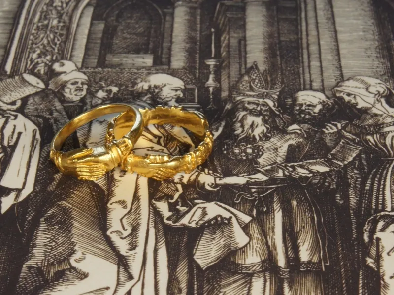 Fede-Ring, gold, stilisierte Aufnahme mit historischer Druckgrafik